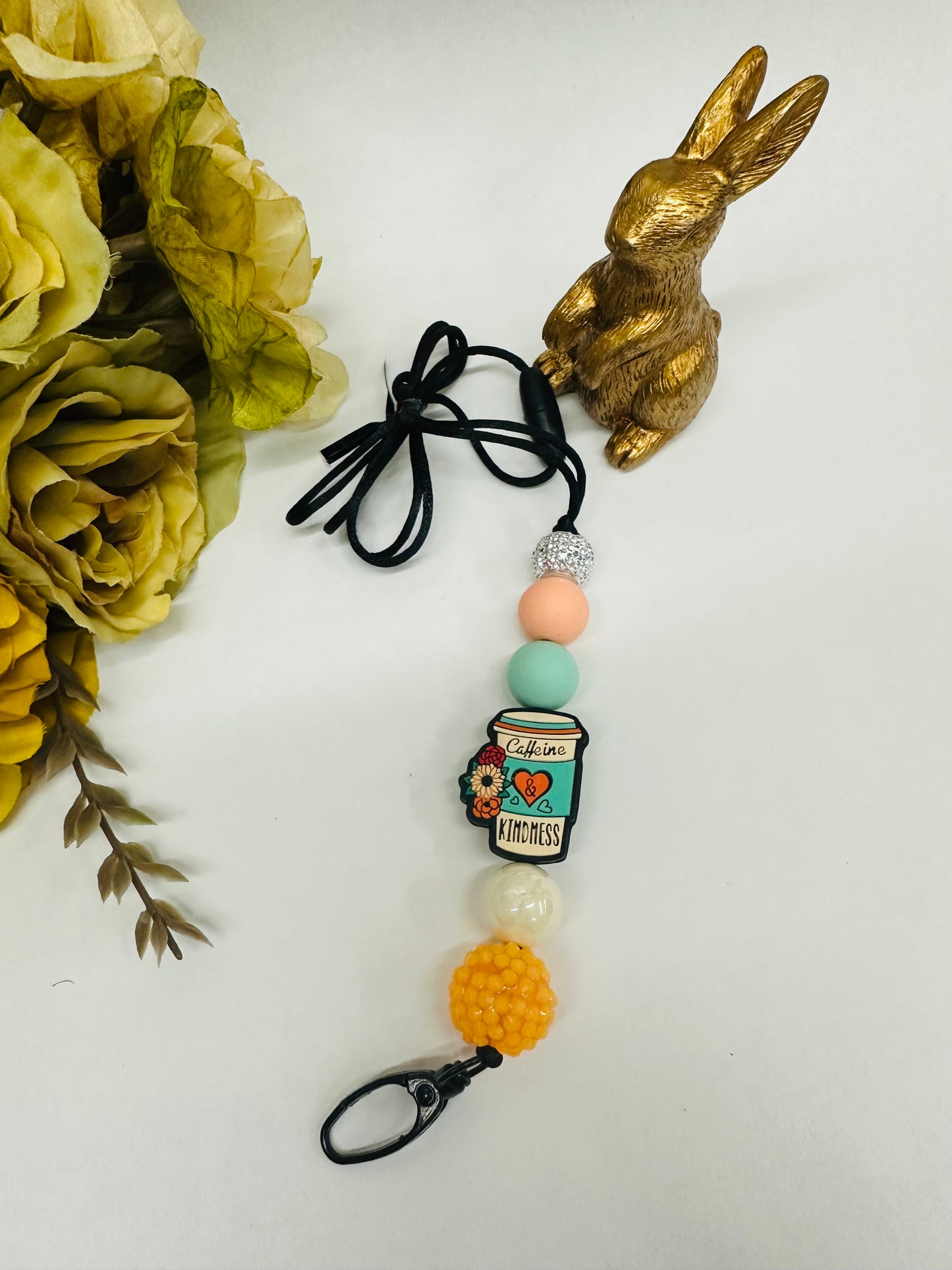 ‘Caffeine & Kindness’ Peach and Teal Lanyard